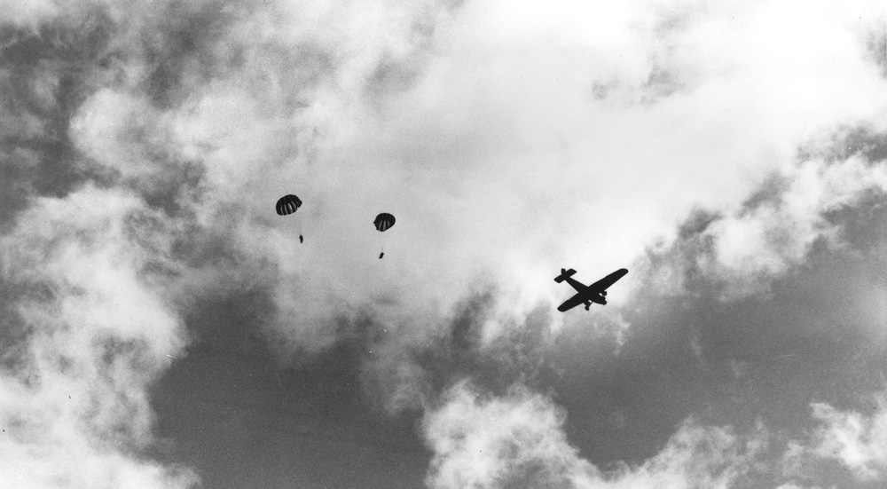 Forest Service smokejumpers dropped over Sherman Gulch, Lolo National Forest, Montana, June 17, 1954. Source: foresthistory.org