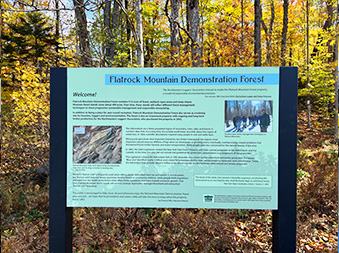 Flatrock Mountain trail sign in Old Forge, New York