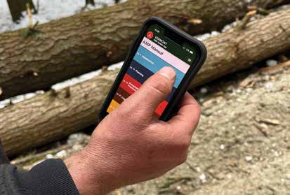 Sam Lincoln uses the Vermont AMP app in the woods.